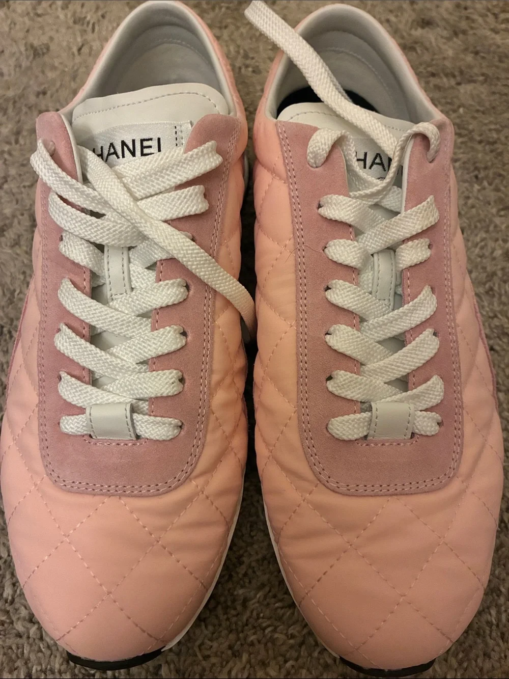 CHANEL Light Pink Quilted Lace-Up Sneakers